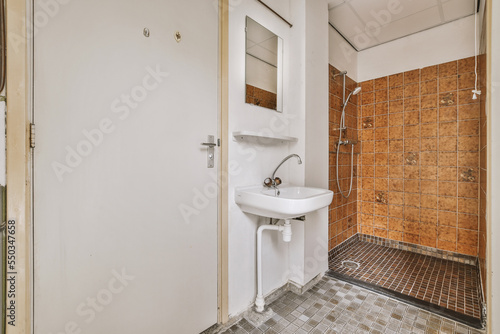 Bathroom with shower and sink