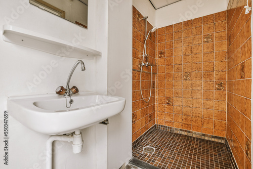 Bathroom with shower and sink