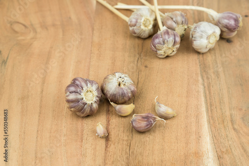 garlic on a wooden surface