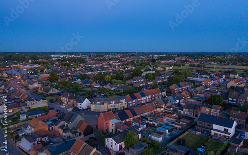 Aerial view of a Flemish town at nightfall