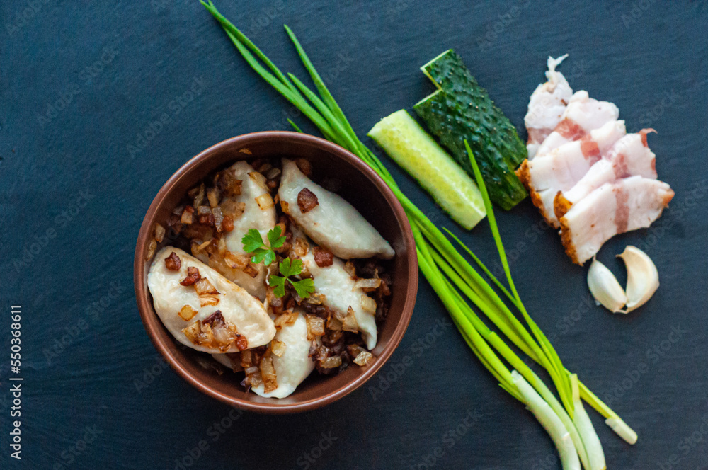 national Ukrainian dish, traditional varenyki with potatoes, cabbage