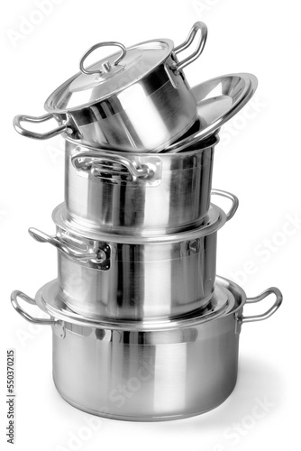 Canvastavla Stack of classic metal kitchen pan on desk