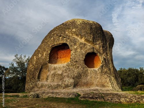 Canchal de los Ojos is a singular rock with two cavities similar to eyes. Spain. photo