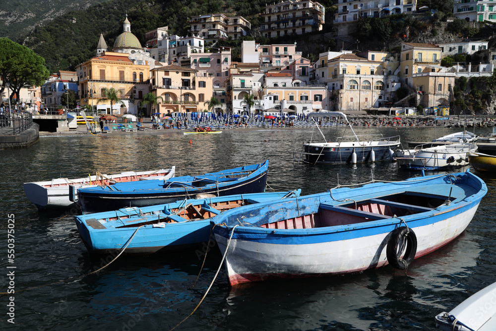 Fishing boats in front of the village of Cetara, Italy