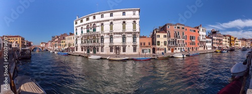 Old houses along the Cannaregio Canal on a sunny day. Venice.