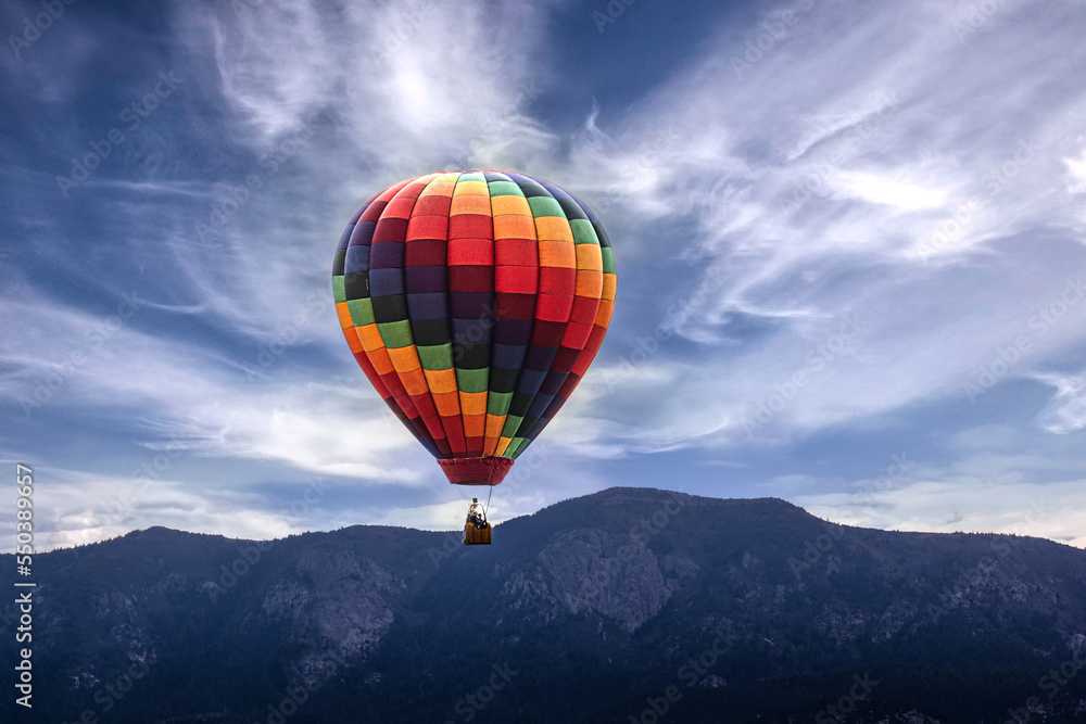 Fototapeta premium Hot Air Balloon Over Mountain