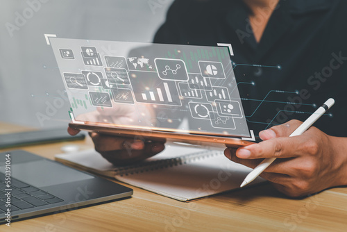 Businessman working and analyzing graph,planning and strategy, Stock market, trader or investor,Technical price graph and indicator,finance technology and investment concept.Investments Funds 