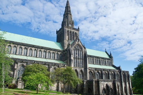 Majestic Glasgow Cathedral with green roof against the blue sky in Scotland