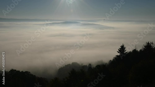Timelapse of morning mist on the mountain in autumn. 4k