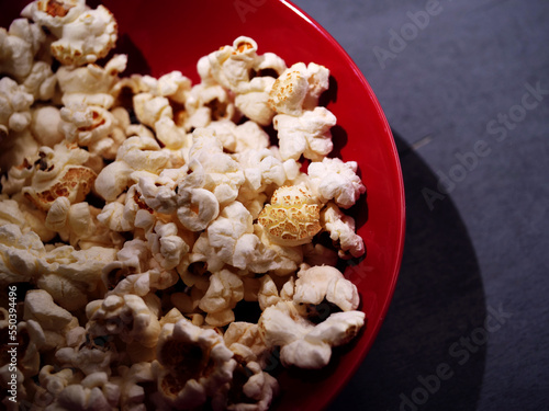 Bowl of popcorn ready to eat close up shot  photo