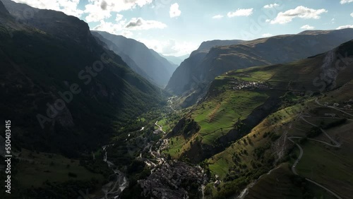 French alps valley aerial view summer la grave village sunny beautiful light green grazing photo