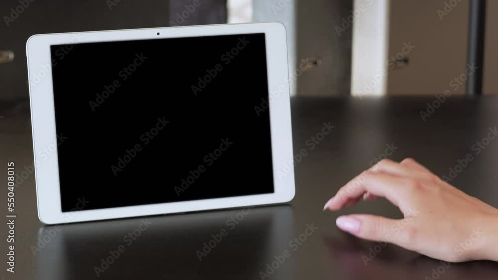 Empty screen. Web call. Digital conference. Unrecognizable stressed woman hand at tablet with mockup copy space black display. Long video shot. Empty screen. Web call. Digital conference. Unrecognizable stressed woman hand at tablet with mockup copy space black display. Long video shot.