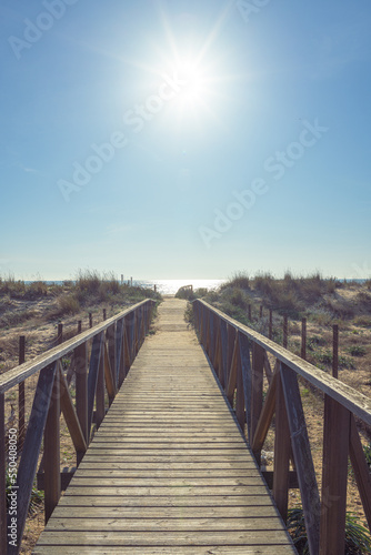 wooden bridge to the sea
