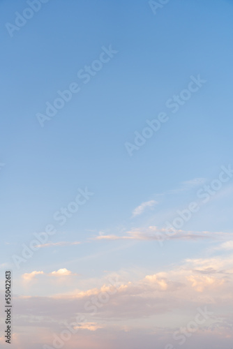 Sunset, sunrise gradual color of sky. Smooth orange blue gradient of dawn sky. Vertical background of heaven at early morning