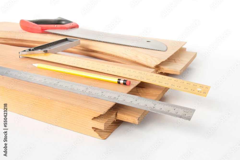 carpentry tools and studded wooden blanks for assembling doors, on a white background
