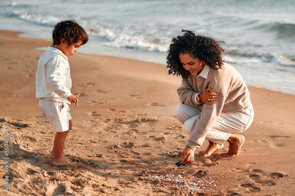 African American family on the beach on the weekend African American family on the beach on the weekend
