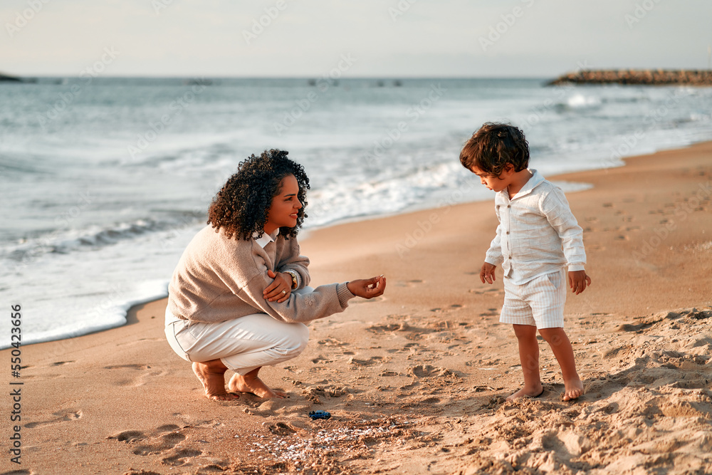 African American family on the beach on the weekend African American family on the beach on the weekend