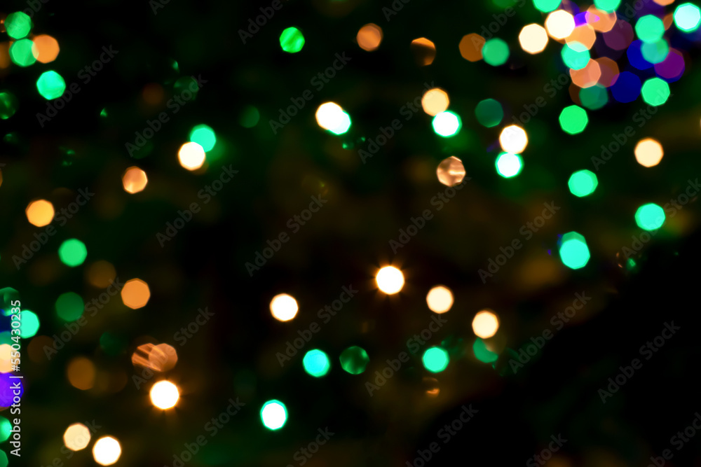 Textured festive background with blurred green lights Textured festive background with blurred green lights