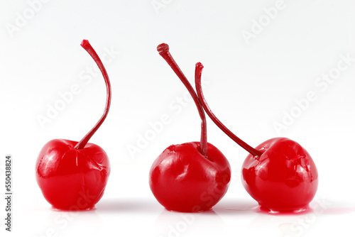 Tableau sur toile Cocktail cherry with stalk on black. red cocktail cherry