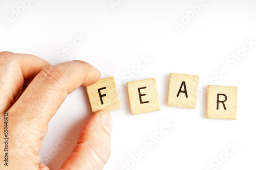 composing the word FEAR with tiles