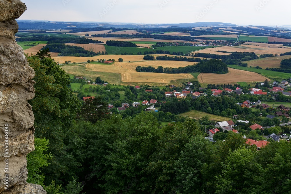  View of the summer field from the wall of the ruins of the Stary Jicin castle. Northeast Moravia. Czechia.
