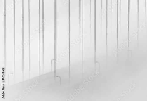 An intimate view of the Golden Gate Bridge, engulfed in fog