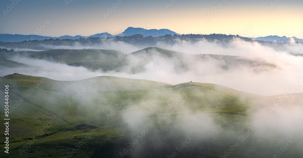 Rolling hills and foggy, misty layers abound in this Sonoma and Marin County scene. Rolling hills and foggy, misty layers abound in this Sonoma and Marin County scene.