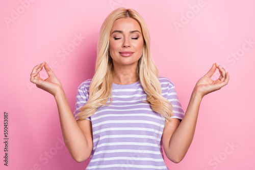 Photo of concentrated adorable lady morning relax rest enjoy hobby time isolated on pink color background