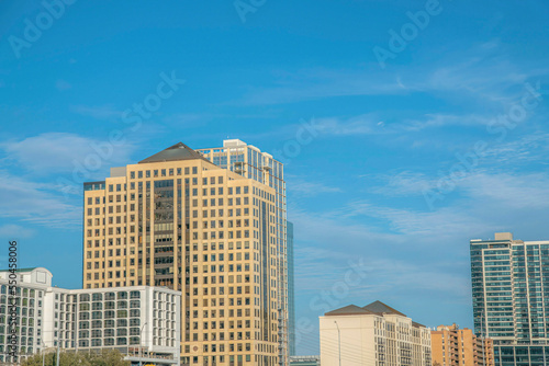 The city skyline of Austin Texas with blue sky background on a sunny day