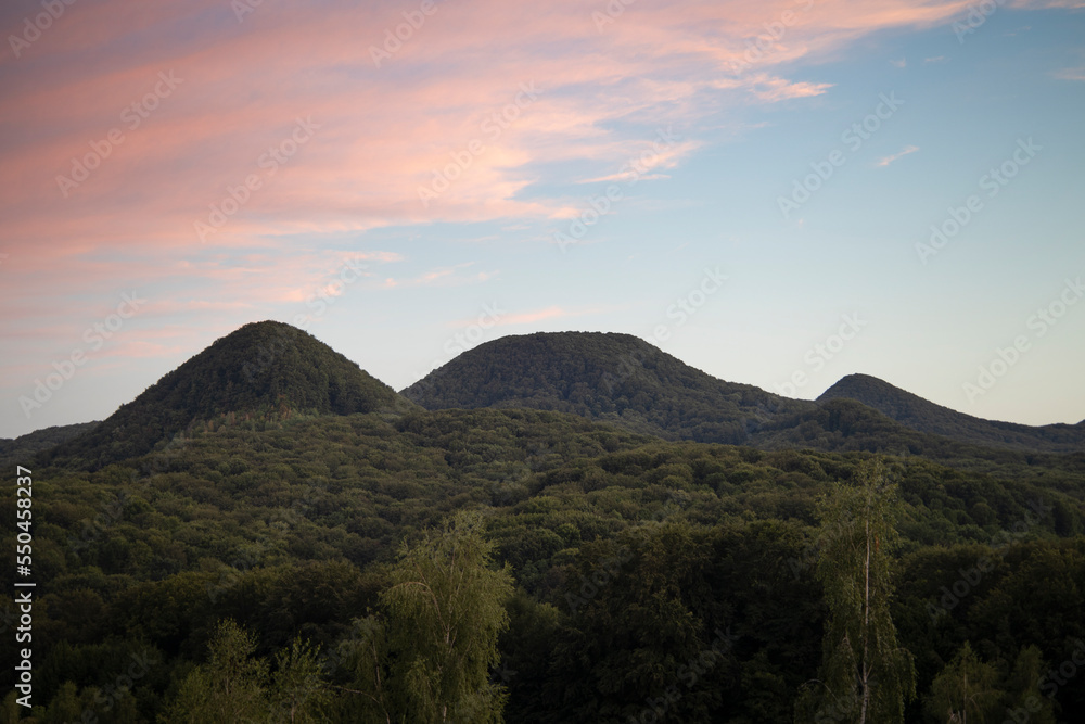 Beautiful view in the mountains landscape, green slopes of the mountains