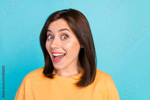 Photo of impressed nice person toothy smile open mouth cant believe isolated on blue color background