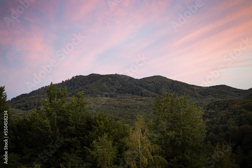 Beautiful view in the mountains landscape, green slopes of the mountains © Alex