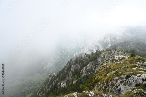 Tara river canyon and Durmitor mountain. Fog on the mountain. Montenegro.