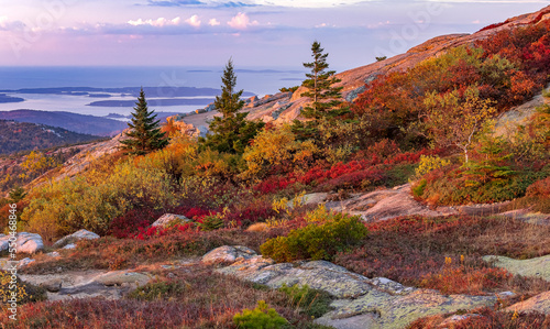 Autumn landscape with mountains and ocean at sunrise 