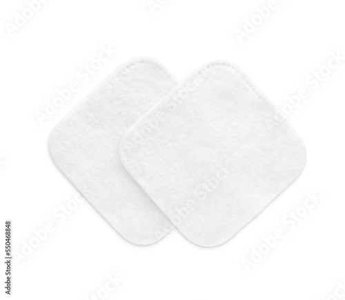 Soft clean cotton pads on white background, top view