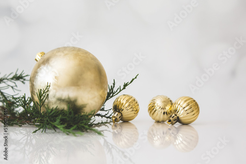 Round Gold Ornaments on a White Background