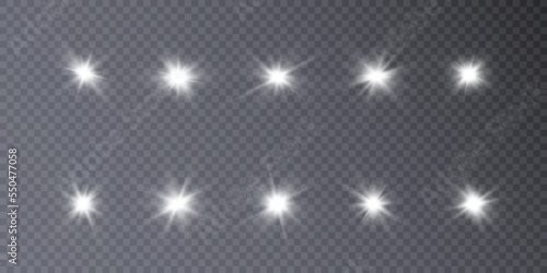 Set of bright white light effects. Bright sun on transparent background for Christmas and New Year design.