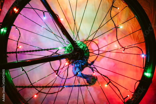 Bicycle wheel decorated with Christmas lights