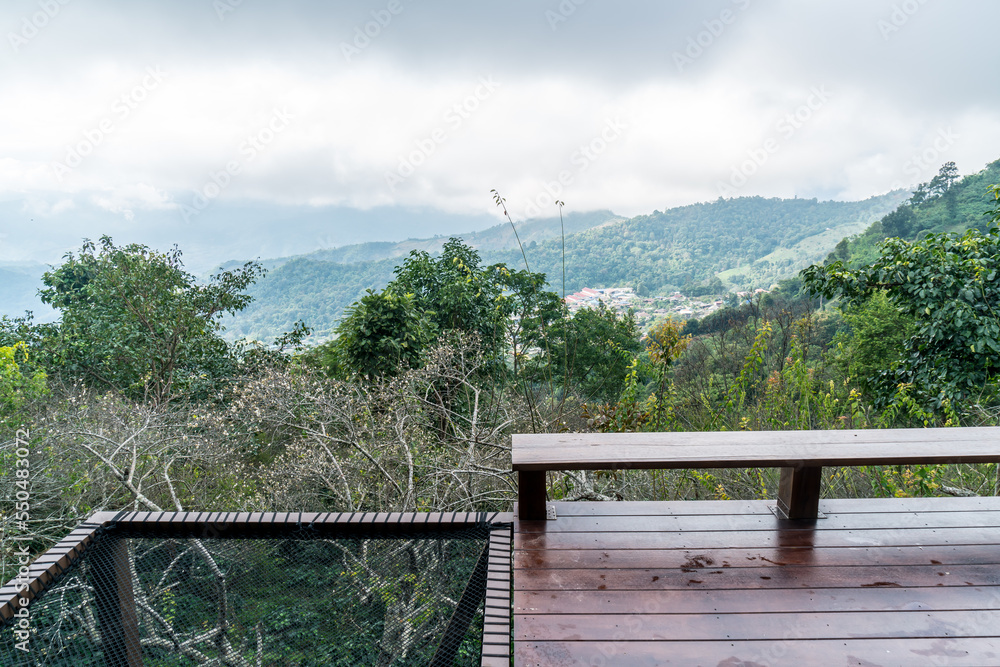 wood bar and chair with mountain hill background wood bar and chair with mountain hill background