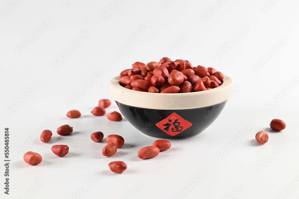RED Peanuts in wooden Peanuts in a bowl isolated RED Peanuts in wooden Peanuts in a bowl isolated