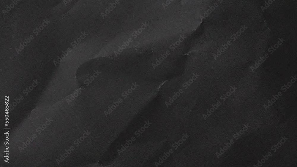 Fondo en movimiento papel negro arrugado