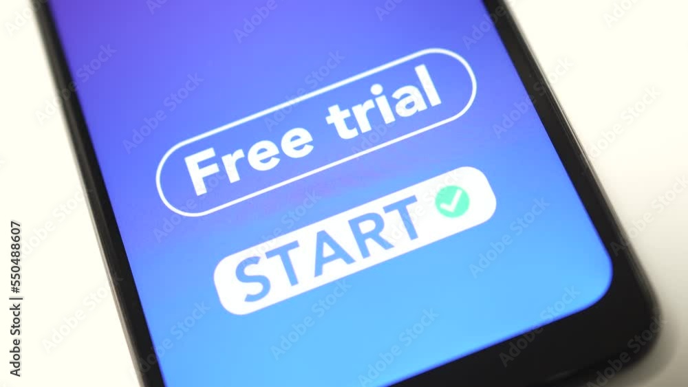 Start a Free Trial Finger Pressing the Button on a Smartphone Start a Free Trial Finger Pressing the Button on a Smartphone