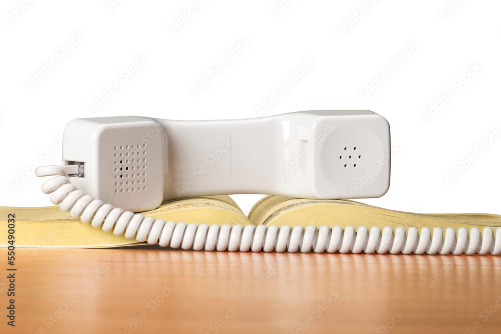 Telephone Receiver on Yellow Pages Telephone Receiver on Yellow Pages