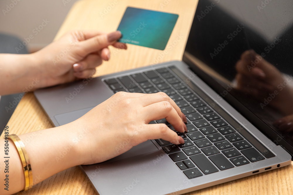 Woman shopping online , women relaxing at home and online shopping with laptop and pay with credit card. Woman shopping online , women relaxing at home and online shopping with laptop and pay with credit card.