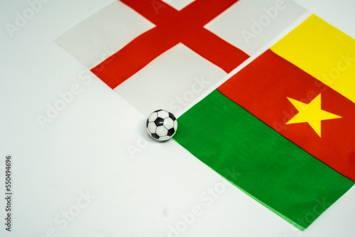 England vs Cameroon, Football match with national flags photo