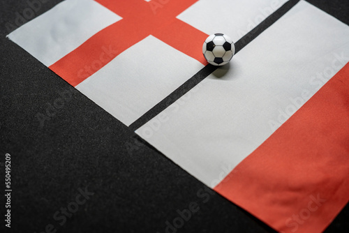 England vs Poland, Football match with national flags photo