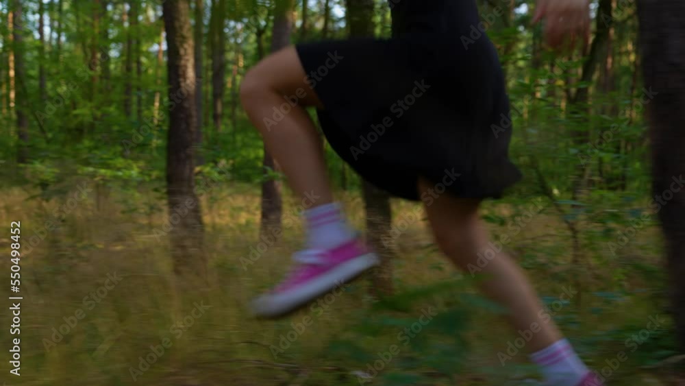The human runs quickly through the forest.
The girl is running away from someone / something through the green forest. Temperate deciduous forest of Central Europe. The human runs quickly through the forest.
The girl is running away from someone / something through the green forest. Temperate deciduous forest of Central Europe.