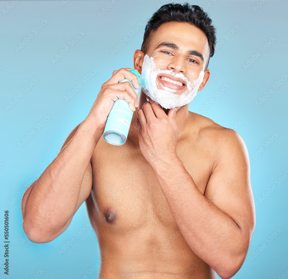 Man, face skincare or shaving cream in grooming routine, hair removal treatment or hair growth management. Portrait, smile or happy model and shave foam in beard wellness on Brazilian blue background