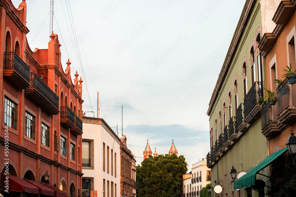 Twilight view of the colonial architecture and historic church of downtown Santiago de Querétaro, Mexico.