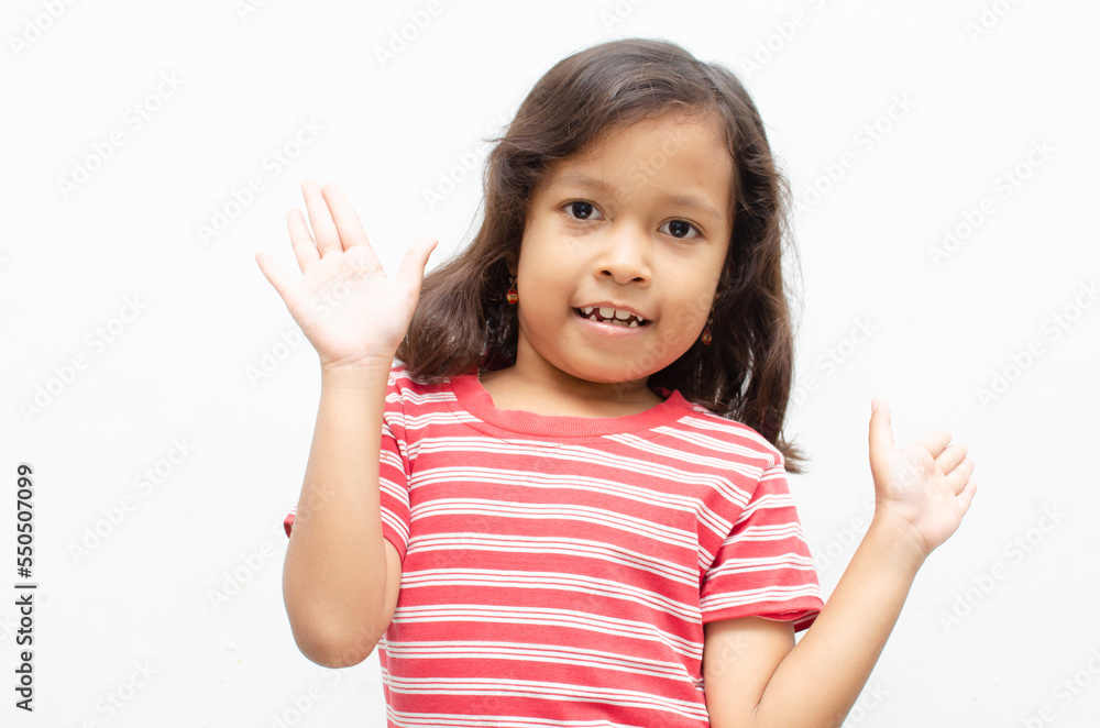 happy smilling asian little girl pose cheerfully with happy surprised expression happy smilling asian little girl pose cheerfully with happy surprised expression